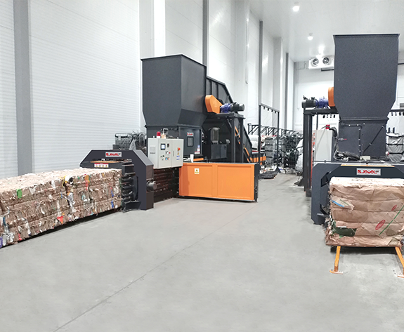 Geautomatiseerde verwijderingsoplossing voor verpakkingsafval in het toonaangevende logistieke centrum voor supermarkten in Rusland